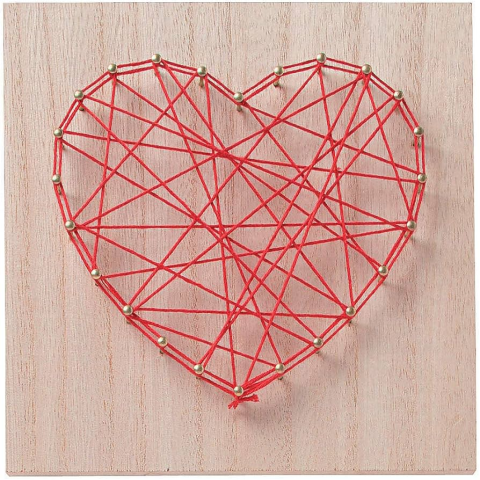Wooden board with nails and red yarn strung through them