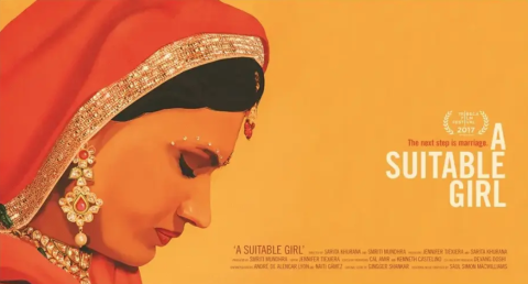 A woman with beautiful earrings modestly covered