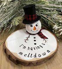 Snowman melting, painted wood slice and wood ball