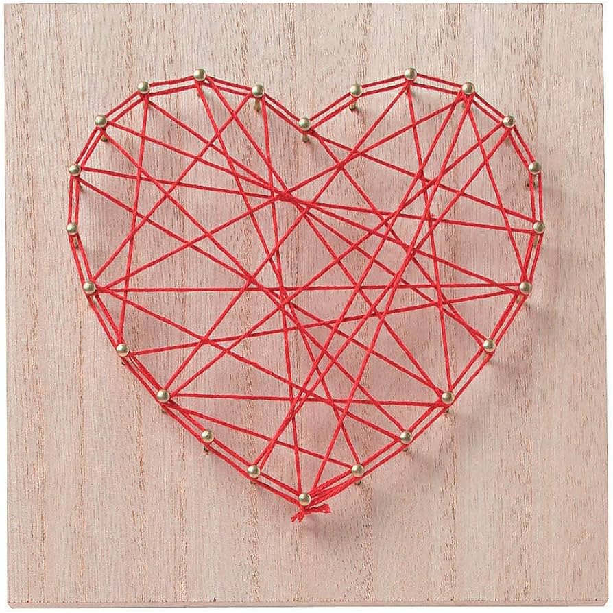 Wooden board with nails and red yarn strung through them